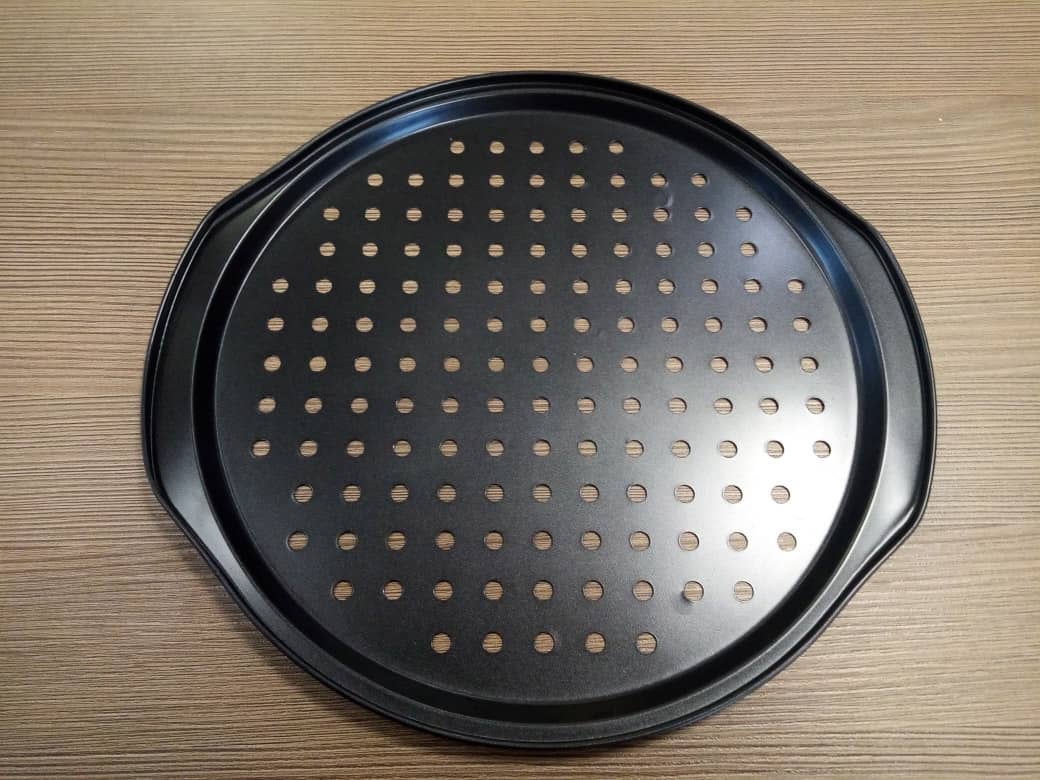 Plaque à pizza perforée